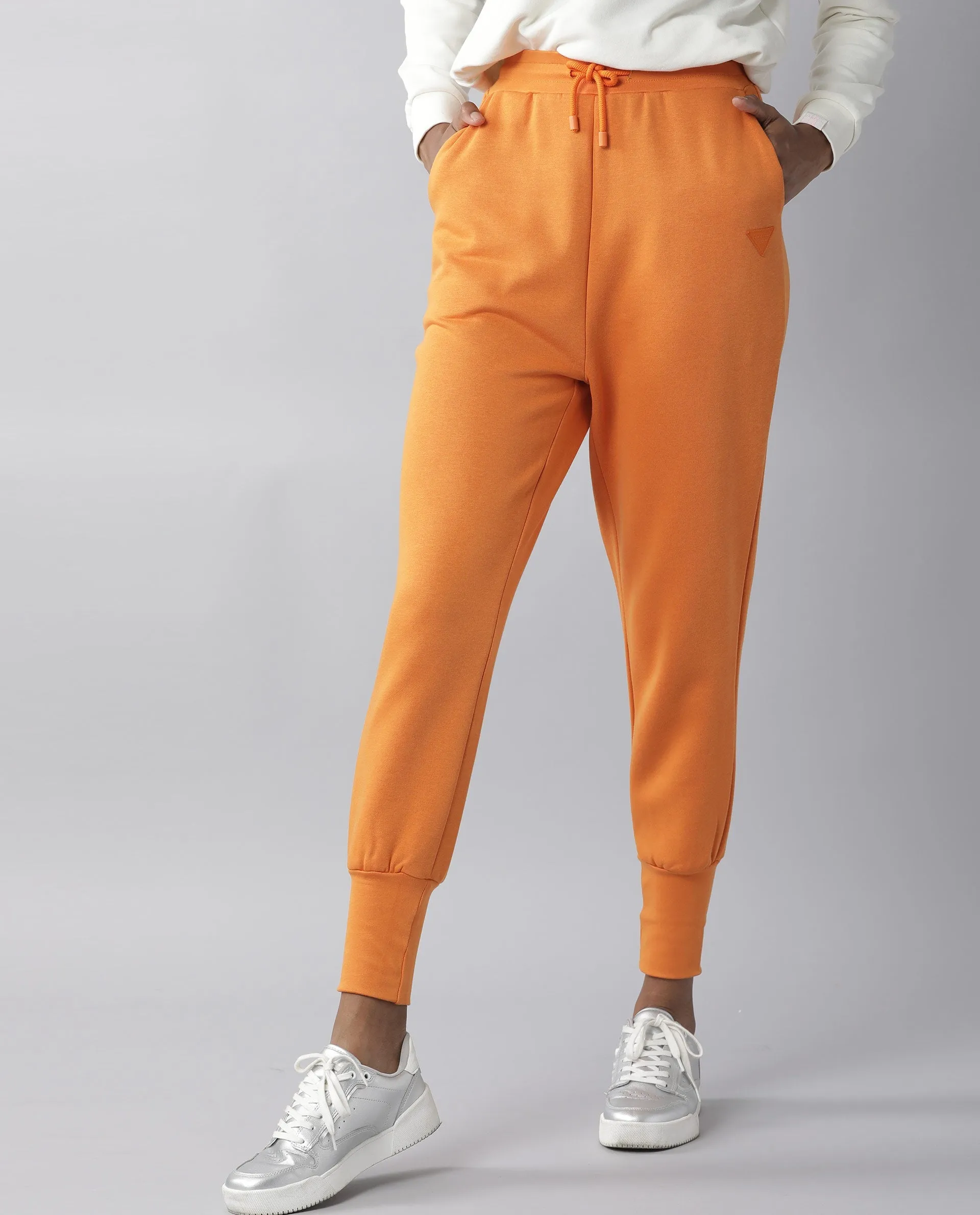 Rareism Women Simp-1 Orange Poly Cotton Fabric Tailored Fit Solid Mid Rise Ankle Length Track Pant
