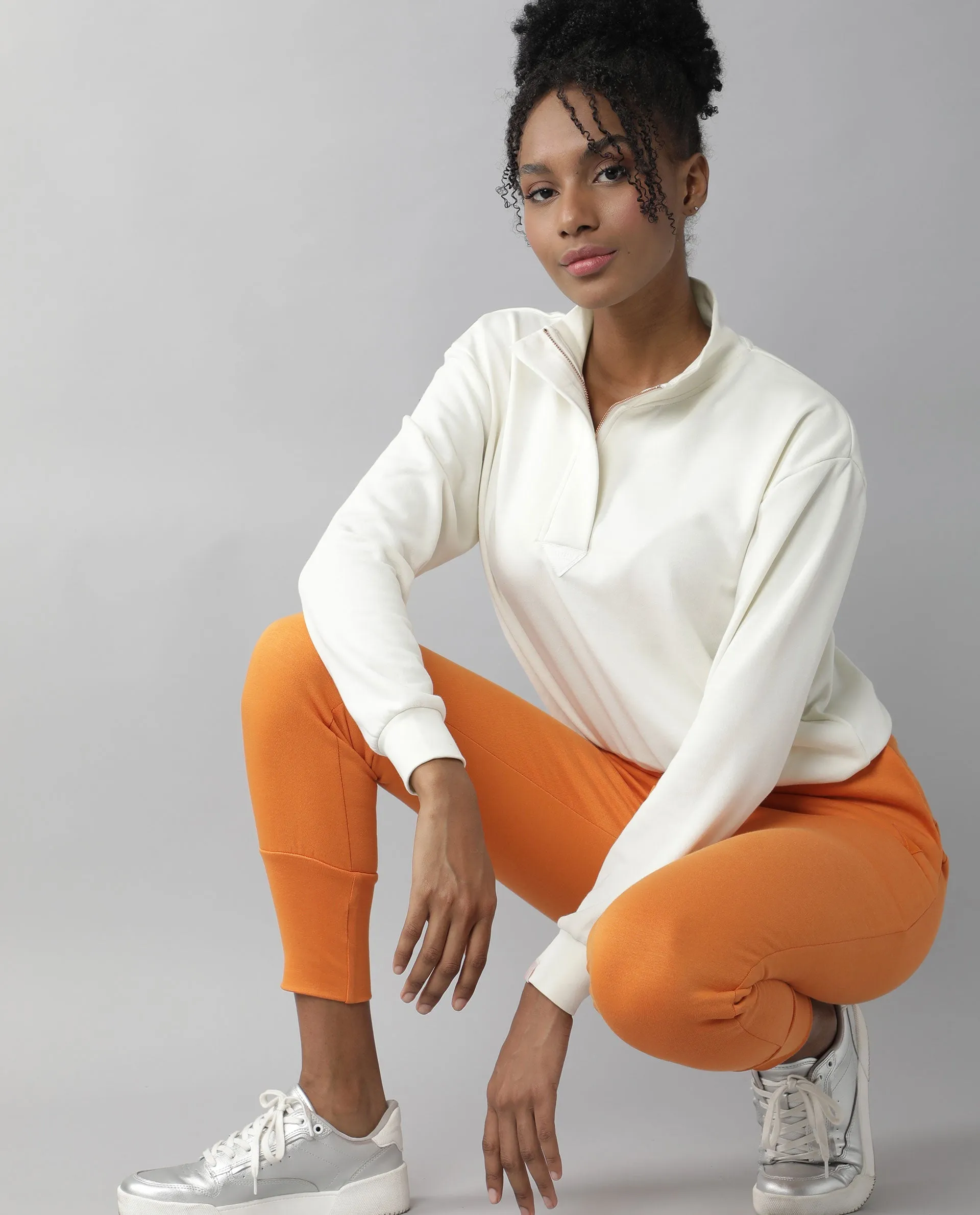 Rareism Women Simp-1 Orange Poly Cotton Fabric Tailored Fit Solid Mid Rise Ankle Length Track Pant
