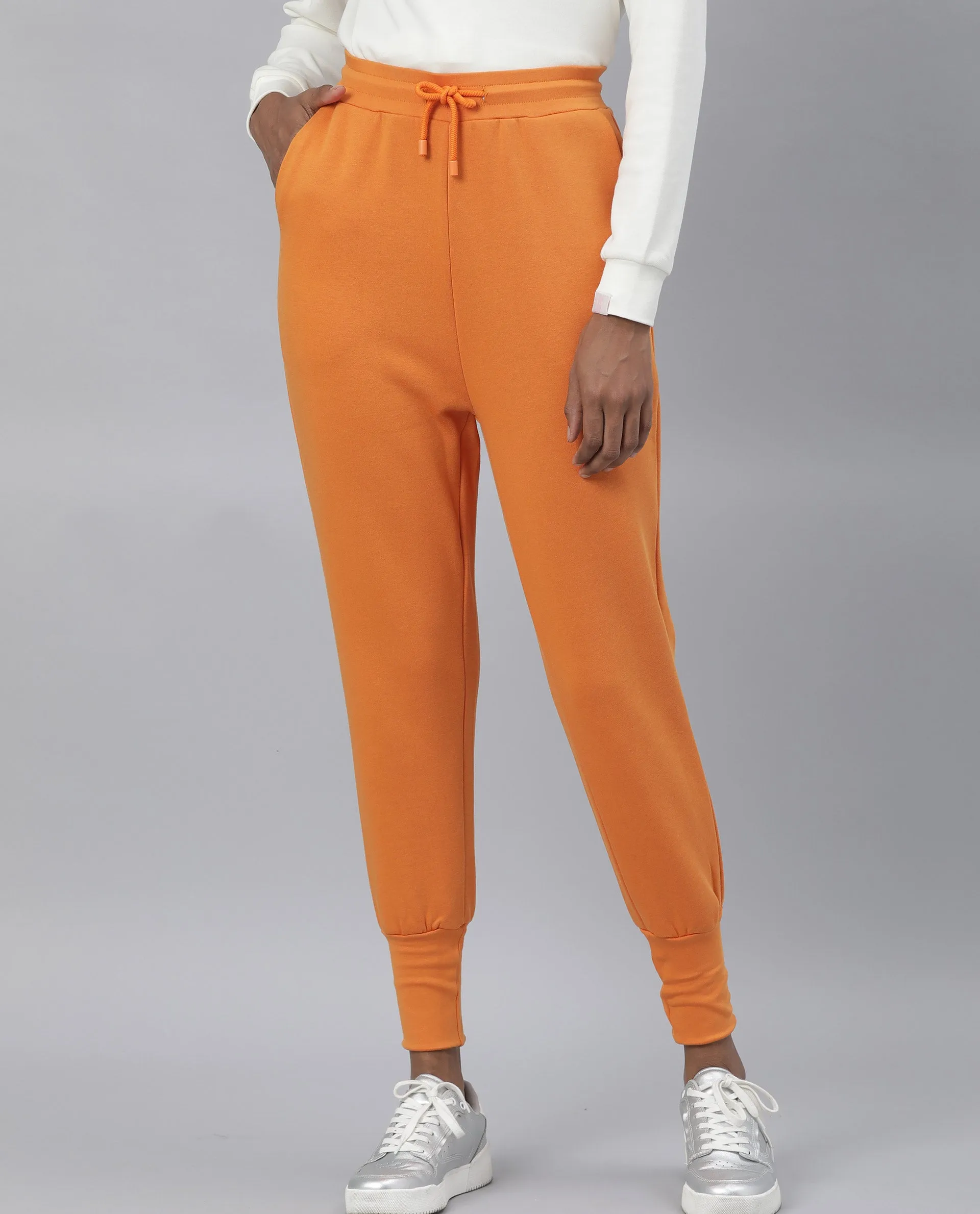 Rareism Women Simp-1 Orange Poly Cotton Fabric Tailored Fit Solid Mid Rise Ankle Length Track Pant