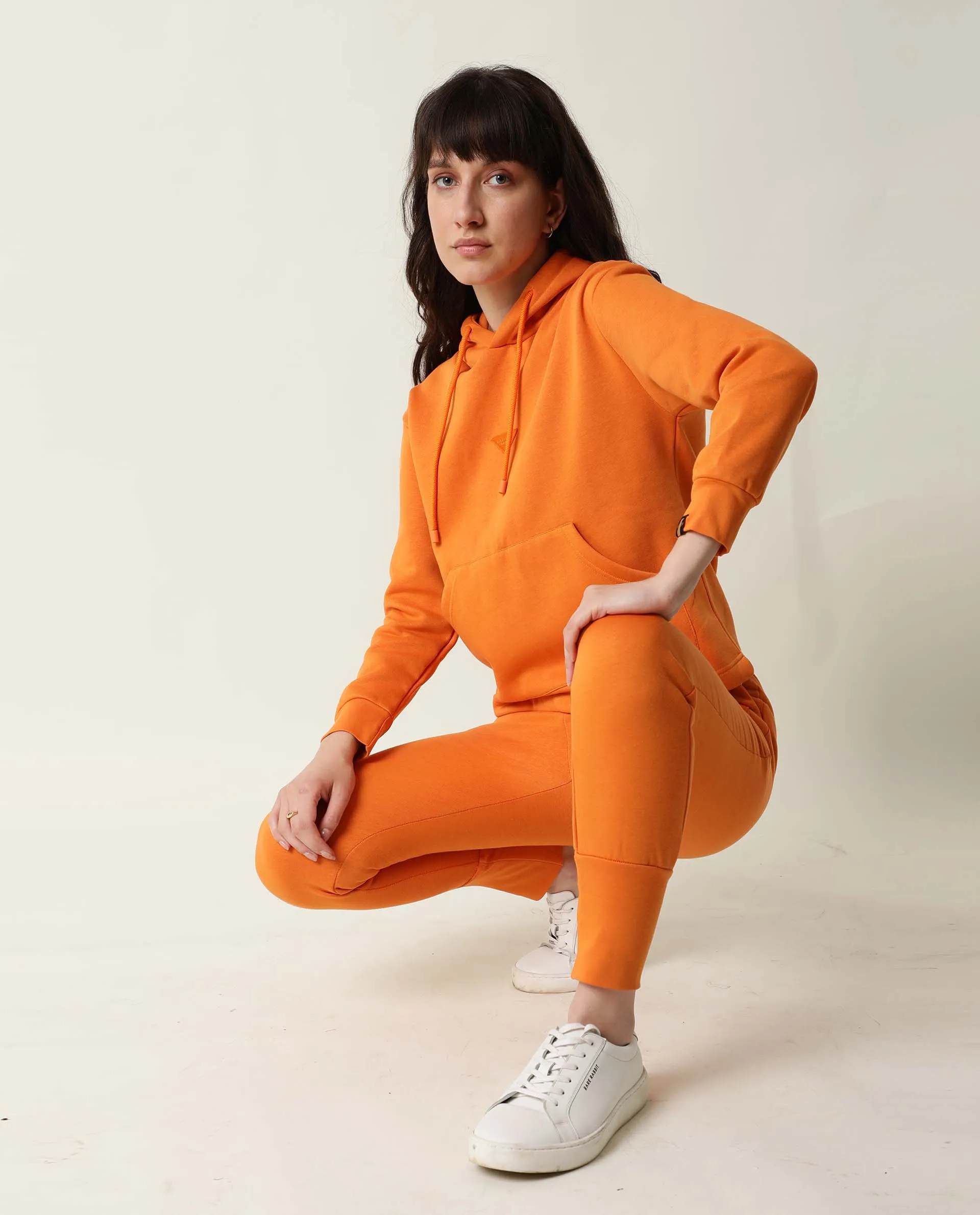 Rareism Women Simp-1 Orange Poly Cotton Fabric Tailored Fit Solid Mid Rise Ankle Length Track Pant