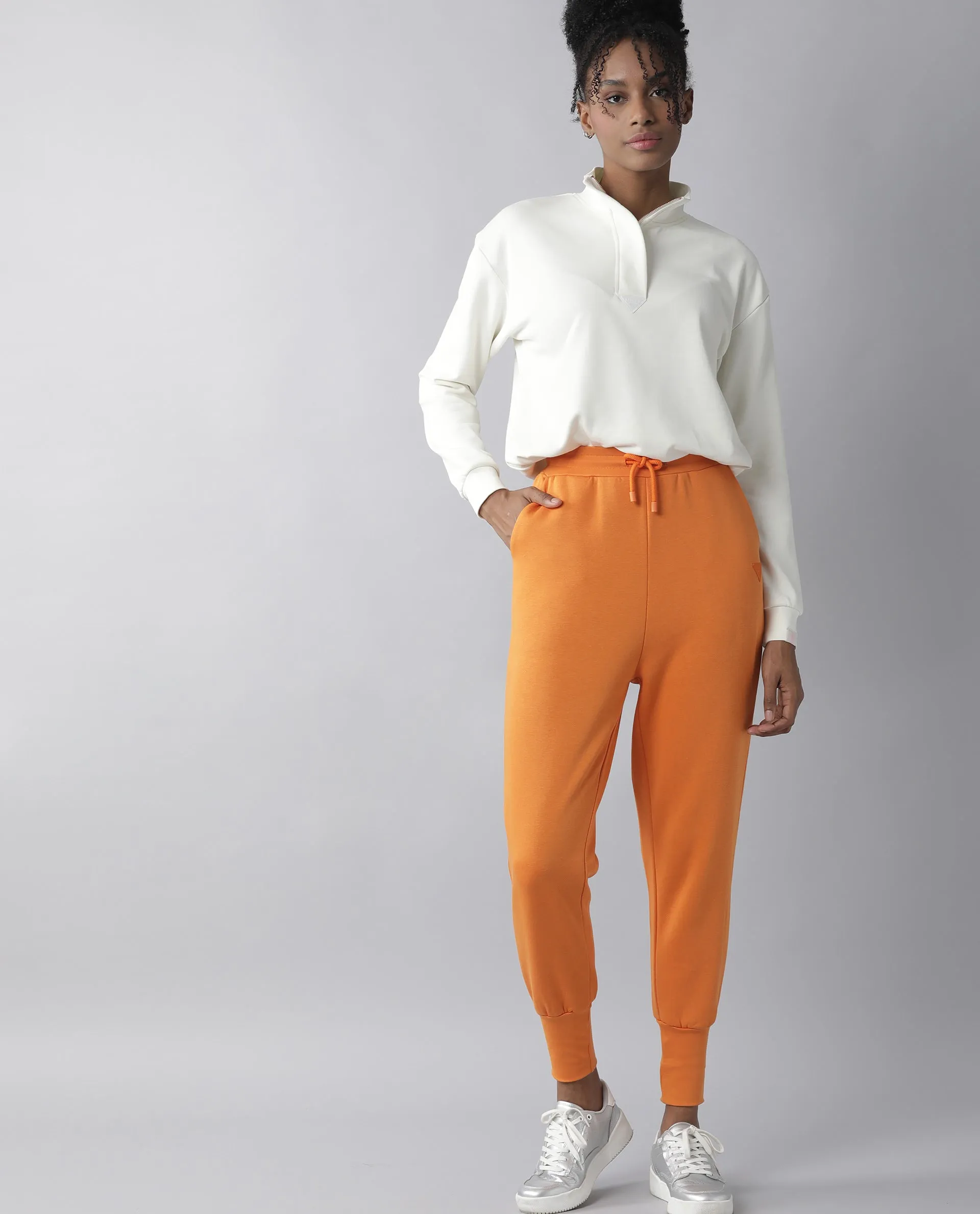 Rareism Women Simp-1 Orange Poly Cotton Fabric Tailored Fit Solid Mid Rise Ankle Length Track Pant