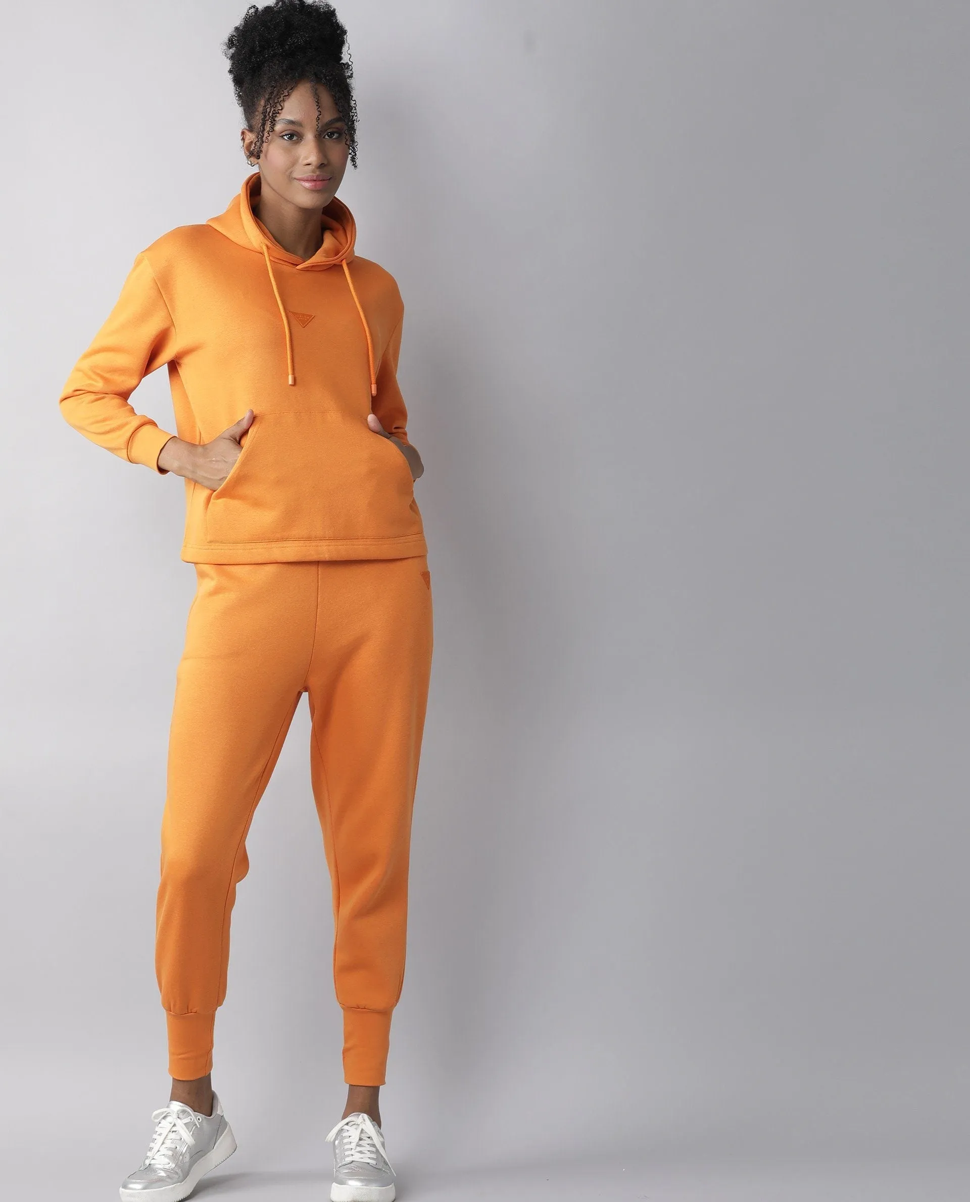 Rareism Women Simp-1 Orange Poly Cotton Fabric Tailored Fit Solid Mid Rise Ankle Length Track Pant